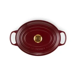 LE CREUSET Cocotte en Fonte Ovale 31 cm Garnet Bouton Doré Signature Hot