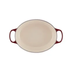 LE CREUSET Cocotte en Fonte Ovale 31 cm Garnet Bouton Doré Signature Hot