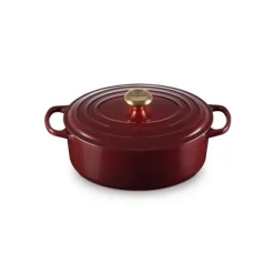 LE CREUSET Cocotte en Fonte Ovale 29 cm Garnet Bouton Doré Signature Clearance