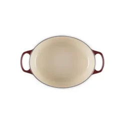 LE CREUSET Cocotte en Fonte Ovale 29 cm Garnet Bouton Doré Signature Clearance